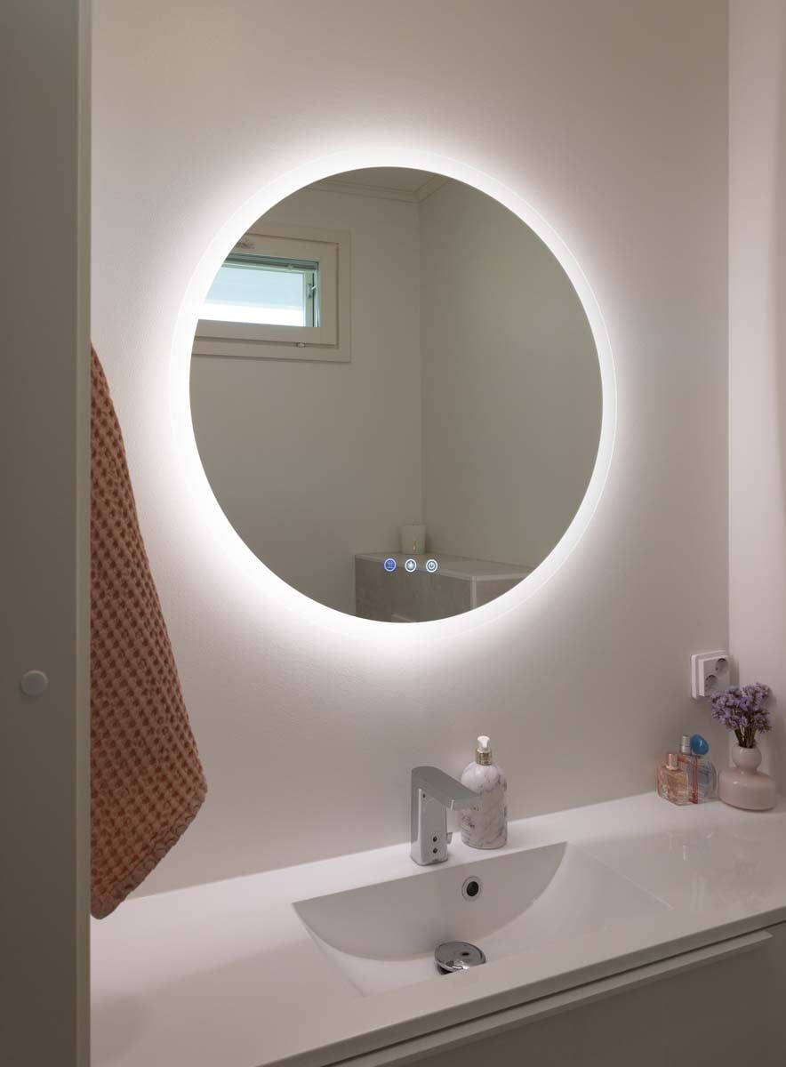 The MOON 800 CCT light mirror with dimmable three colour temperatures and a defogging function provides plenty of light in the toilet. LedStore.fi
